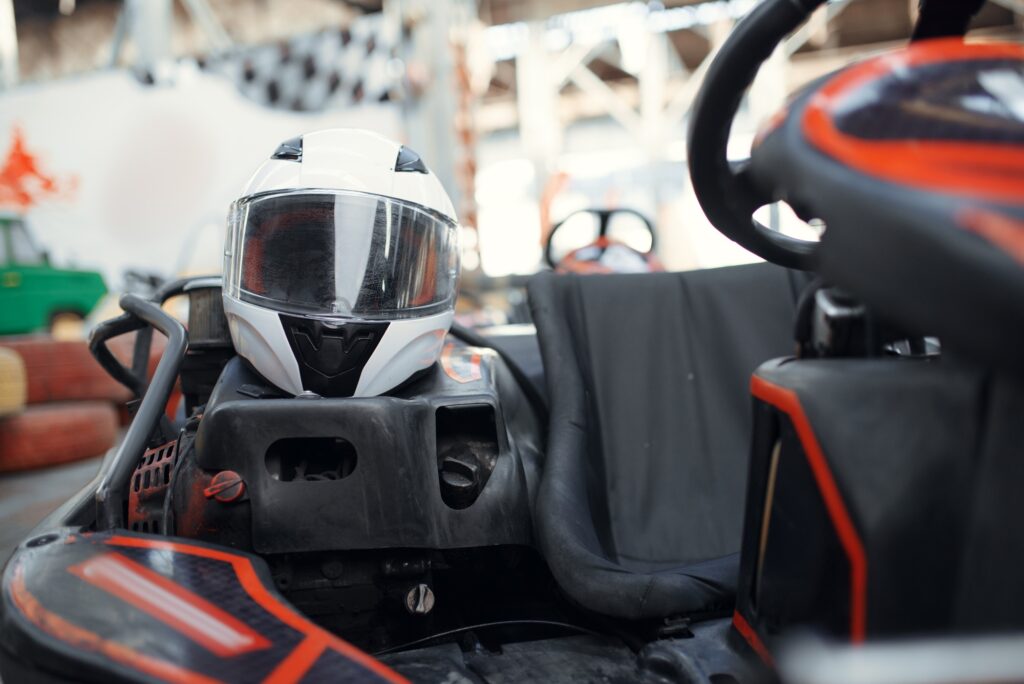 Helmet in go kart car closeup view, karting